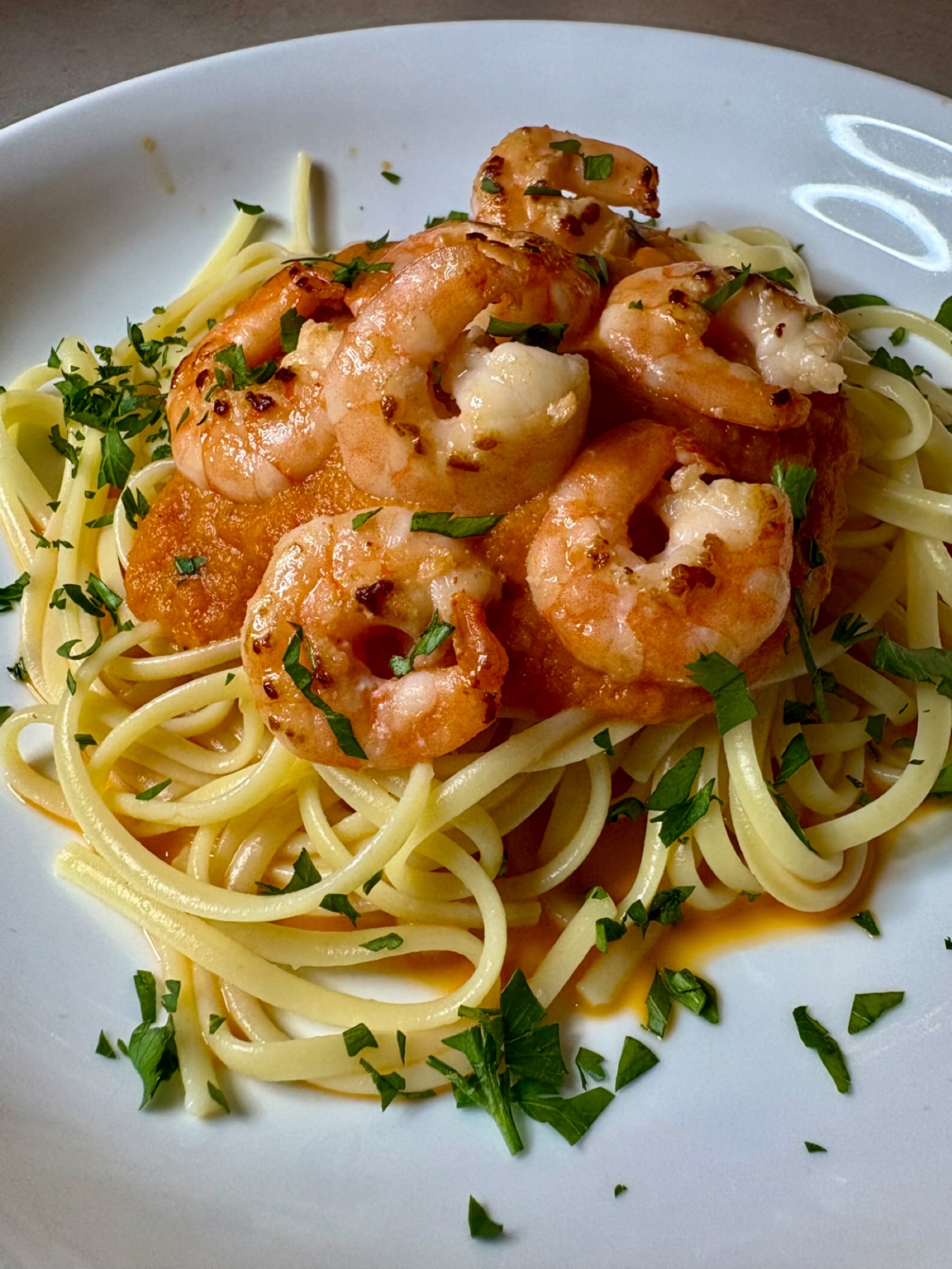 Fancied a bit of pasta before we begin on the festive eating. Made a roasted tomato, garlic, onion, white wine and parsley sauce (as I accidentally bought Thai basil instead of basil… ?) and served it with linguine and some delicious pan-fried king prawns. Perfect for Xmas eve eve!
#prawns #pasta #prawnpasta