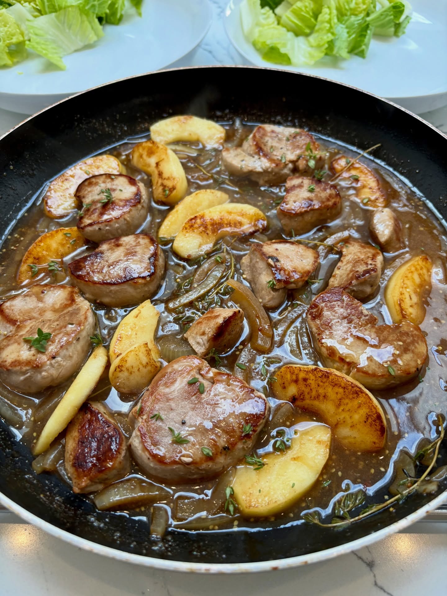 Recipe experiment tonight! Sautéed some pork medallions for a couple of minutes until browned (then set aside), then fried some white onion slices before deglazing the pan with some vintage cider. Let that reduce a bit before adding teaspoon of whole grain mustard, fresh thyme and some chicken stock. Left that to reduce a bit more then added the pork back to the pan, along with some apple slices that I’d caramelised earlier. Served it with my favourite Parmentier potatoes and some salad leaves. Was a hit! ?
#pork #porkincider #cider
